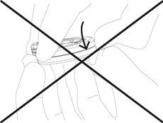 4. Tryk ikke på den øverste del af dækslet imens